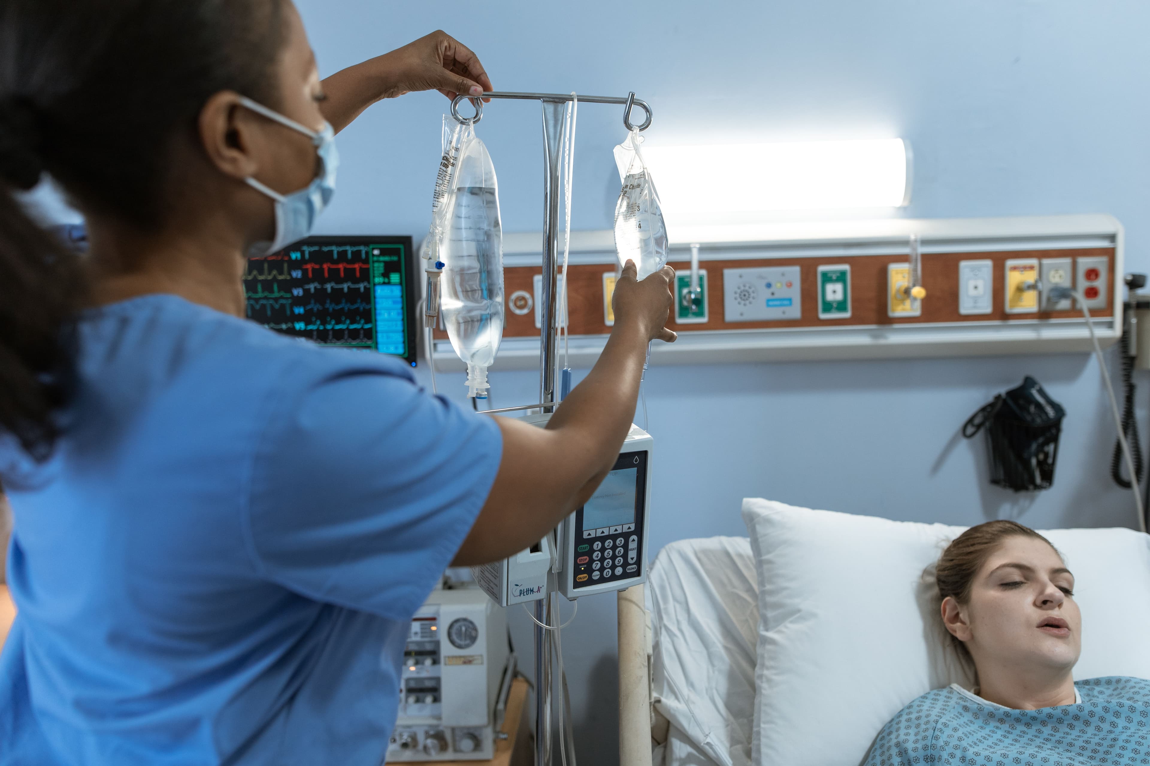 Caregiver providing attentive care to a nursing home resident